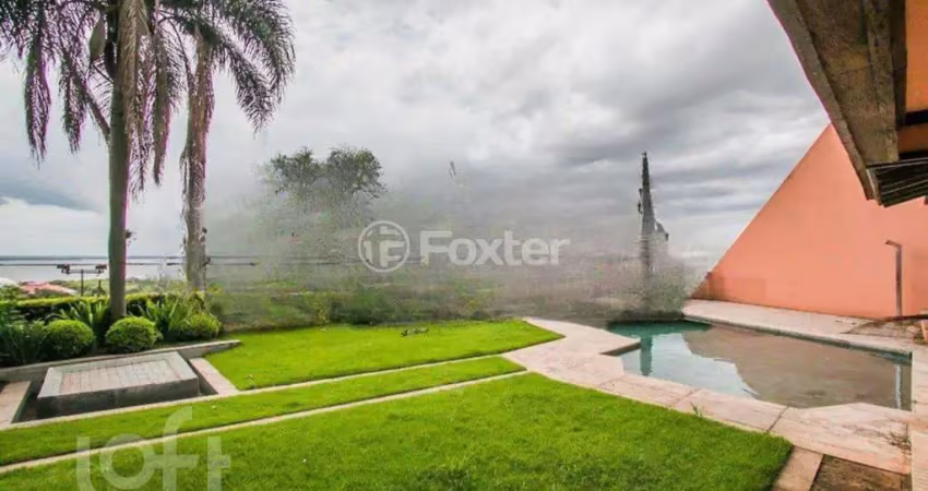 Casa em condomínio fechado com 4 quartos à venda na Rua Gilberto Laste, 180, Santa Tereza, Porto Alegre