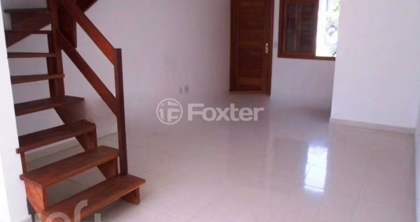 Casa com 3 quartos à venda na Rua Henrique Anawate, 484, Guarujá, Porto Alegre
