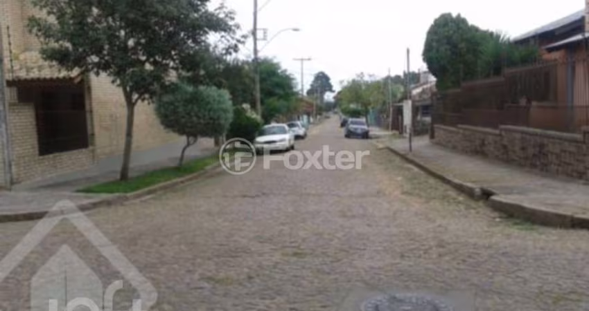 Casa com 4 quartos à venda na Rua Jacundá, 638, Guarujá, Porto Alegre