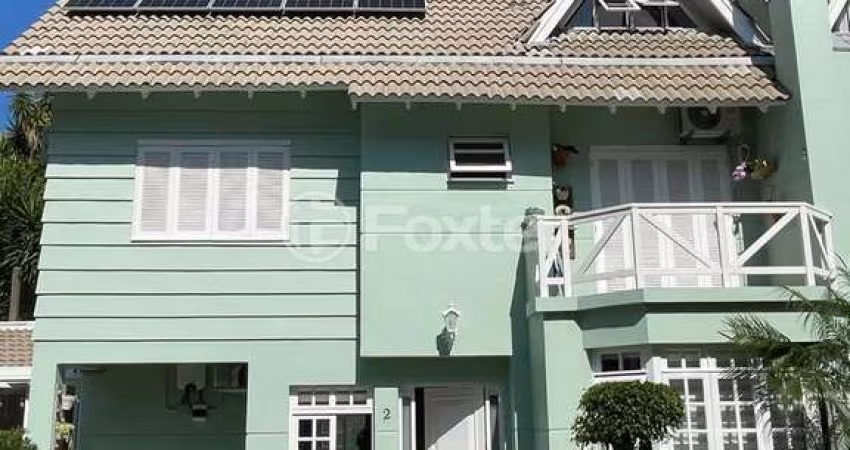 Casa em condomínio fechado com 4 quartos à venda na Rua Jacipuia, 275, Guarujá, Porto Alegre