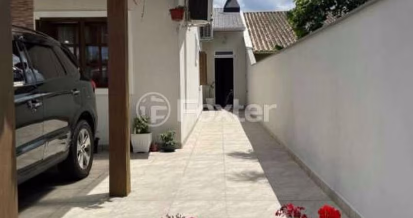 Casa com 3 quartos à venda na Rua Stringhini, 99, Hípica, Porto Alegre