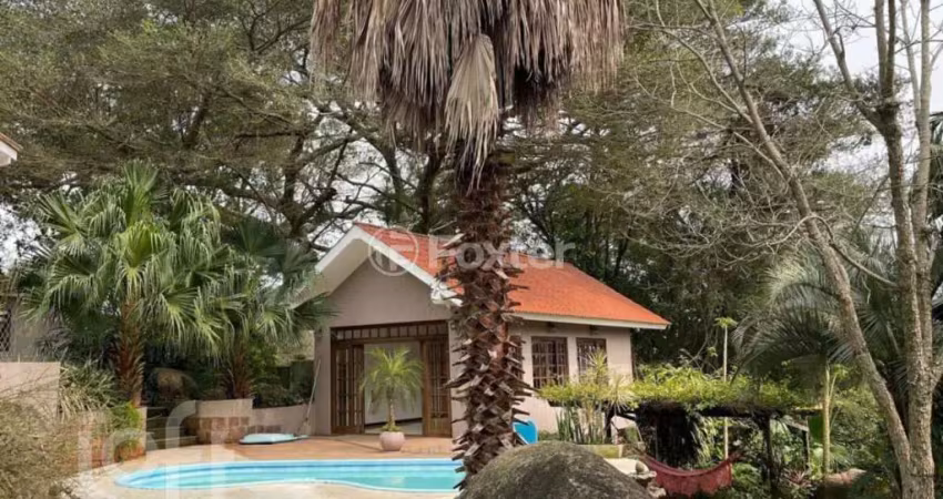 Casa com 5 quartos à venda na Rua dos Guaranis, 390, Espírito Santo, Porto Alegre