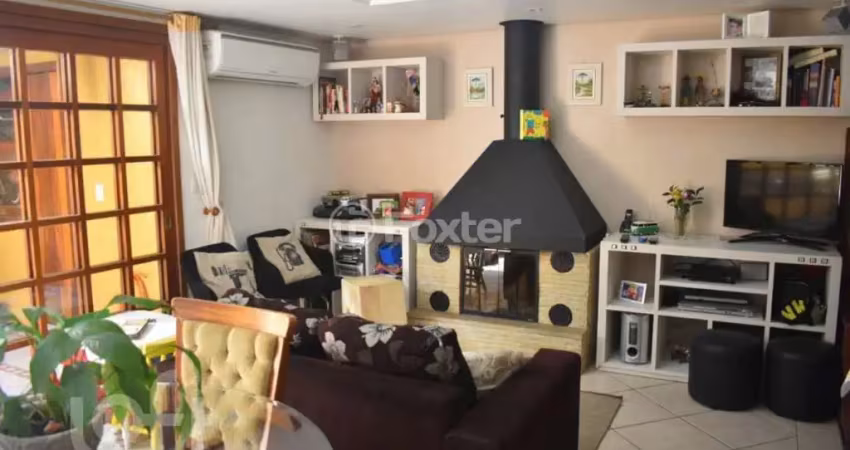 Casa em condomínio fechado com 3 quartos à venda na Avenida Coronel Marcos, 2171, Pedra Redonda, Porto Alegre