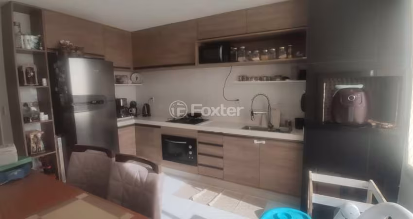 Casa com 3 quartos à venda na Rua Henrique Anawate, 652, Guarujá, Porto Alegre