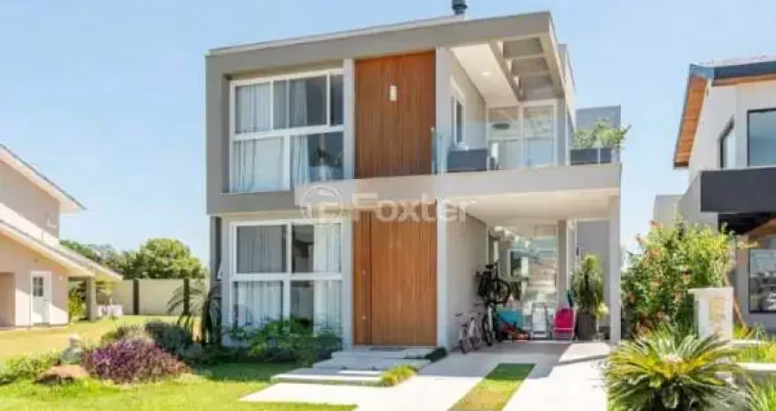 Casa em condomínio fechado com 4 quartos à venda na Estrada Do Conde, 4000, Industrial, Eldorado do Sul