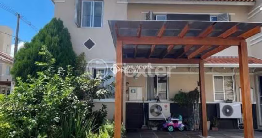 Casa em condomínio fechado com 3 quartos à venda na Avenida João Ferreira Jardim, 140, Parque Santa Fé, Porto Alegre
