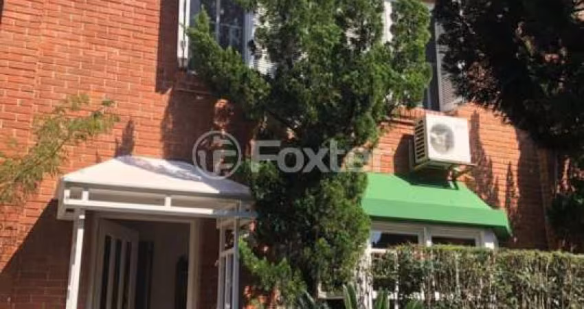 Casa em condomínio fechado com 4 quartos à venda na Rua Engenheiro Ildefonso Simões Lopes, 114, Três Figueiras, Porto Alegre