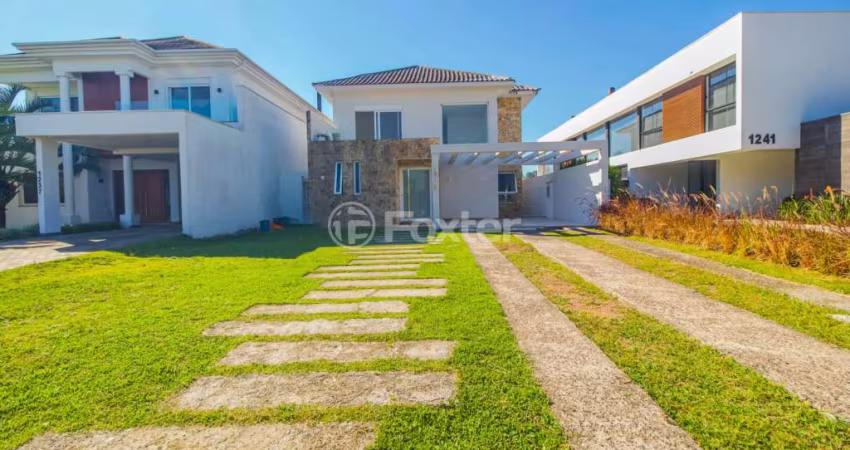 Casa em condomínio fechado com 5 quartos à venda na Avenida Juca Batista, 9000, Belém Novo, Porto Alegre