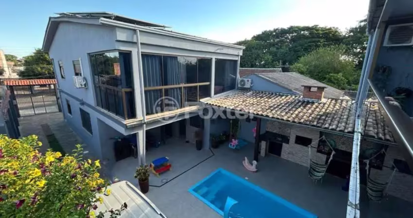 Casa com 4 quartos à venda na Rua Sapucaia, 840, Niterói, Canoas