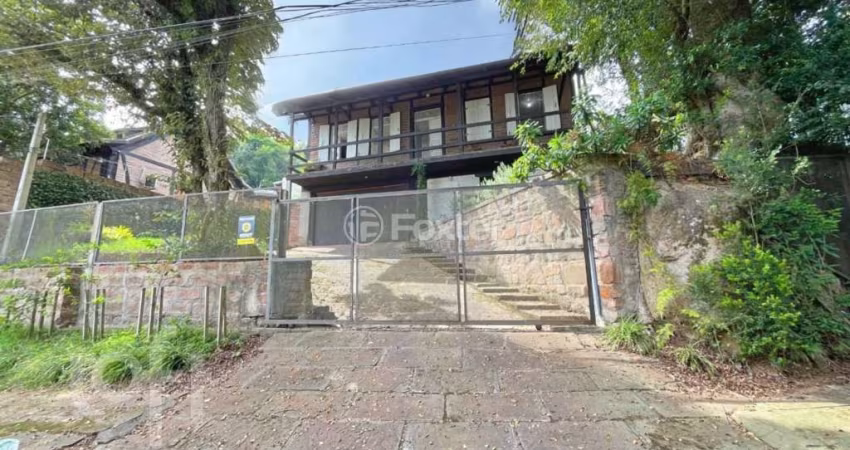Casa com 3 quartos à venda na Rua Charruas, 59, Espírito Santo, Porto Alegre