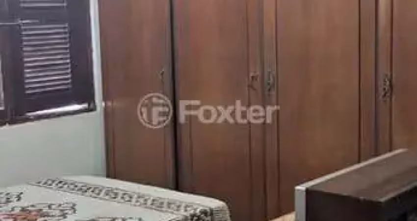 Casa com 3 quartos à venda na Rua Ângelo Passuelo, 390, Vila Nova, Porto Alegre