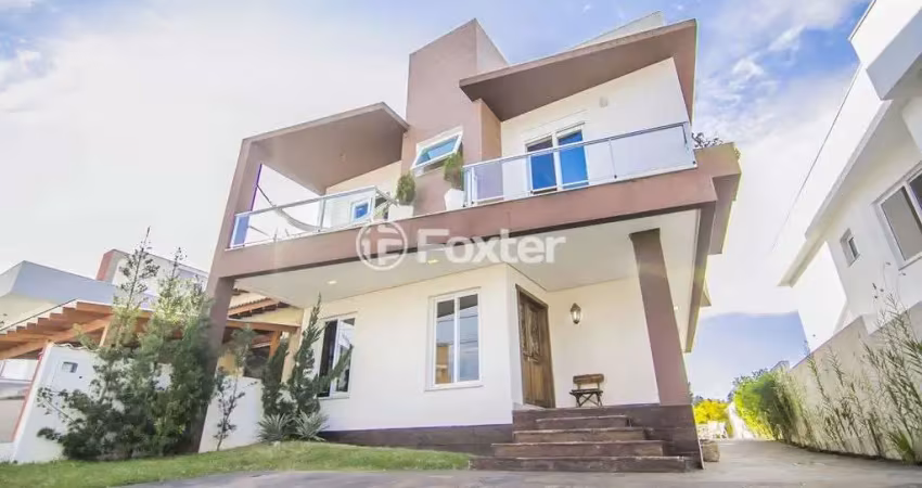Casa em condomínio fechado com 3 quartos à venda na Avenida Edgar Pires de Castro, 540, Hípica, Porto Alegre