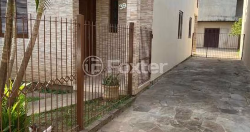 Casa com 4 quartos à venda na Rua Japeju, 39, Arquipélago, Porto Alegre