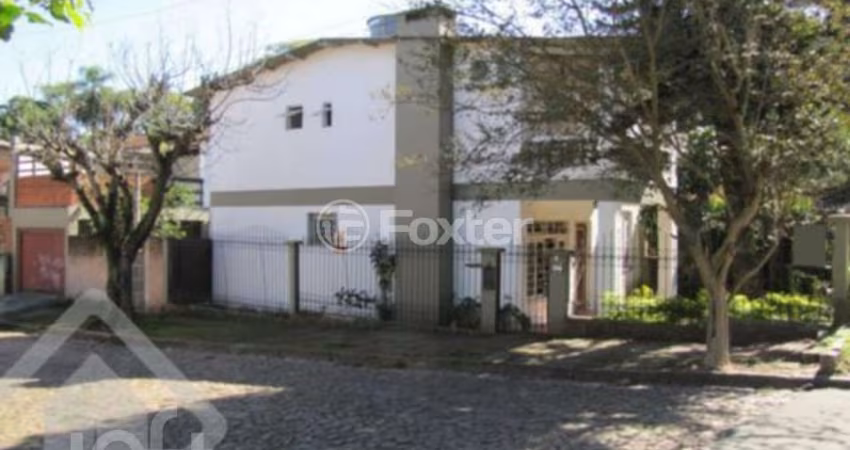 Casa com 3 quartos à venda na Avenida da Cavalhada, 6227, Cavalhada, Porto Alegre
