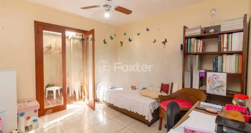 Casa com 4 quartos à venda na Rua Artur Azevedo, 242, Partenon, Porto Alegre
