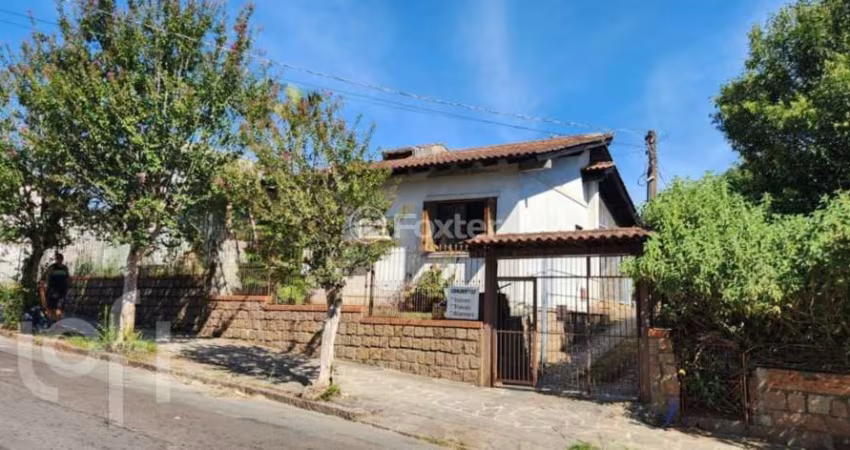Casa com 3 quartos à venda na Rua Atílio Supertti, 287, Vila Nova, Porto Alegre