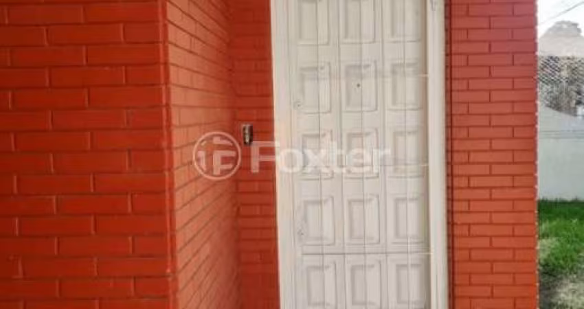 Casa com 3 quartos à venda na Rua Urussanga, 271, Guarujá, Porto Alegre