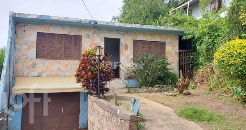 Casa com 2 quartos à venda na Rua Agulhas Negras, 106, Coronel Aparício Borges, Porto Alegre