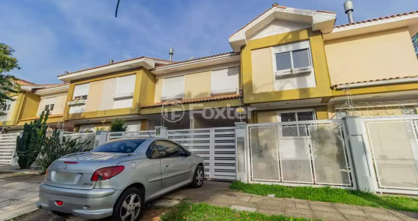 Casa em condomínio fechado com 3 quartos à venda na Rua Cangussu, 680, Nonoai, Porto Alegre
