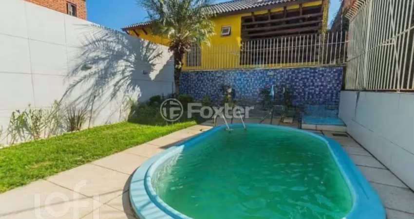 Casa com 3 quartos à venda na Rua Olécio Cavedini, 45, Espírito Santo, Porto Alegre