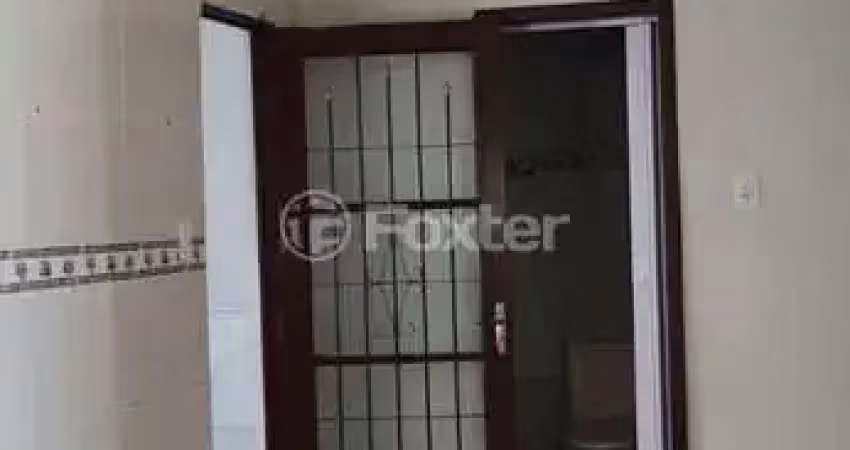 Casa com 3 quartos à venda na Rua Aristides Joaquim do Nascimento, 20, Vila Nova, Porto Alegre