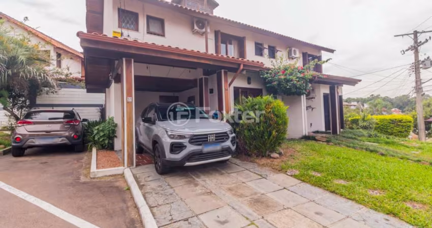 Casa em condomínio fechado com 3 quartos à venda na Avenida Eduardo Prado, 695, Cavalhada, Porto Alegre