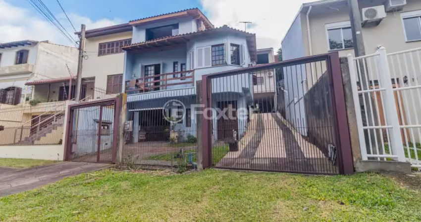 Casa com 5 quartos à venda na Rua Nero José da Silva Filho, 185, Partenon, Porto Alegre