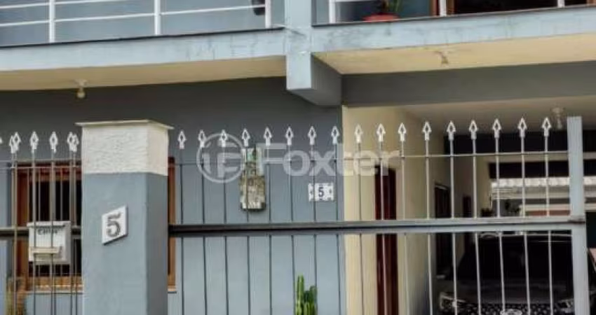Casa com 3 quartos à venda na Rua Moroty Baldwin Michel, 5, Rubem Berta, Porto Alegre