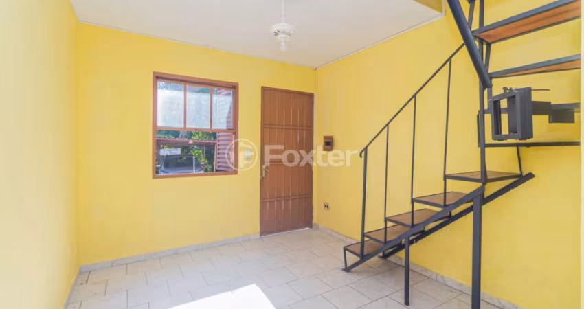 Casa em condomínio fechado com 2 quartos à venda na Avenida Vicente Monteggia, 2772, Cavalhada, Porto Alegre