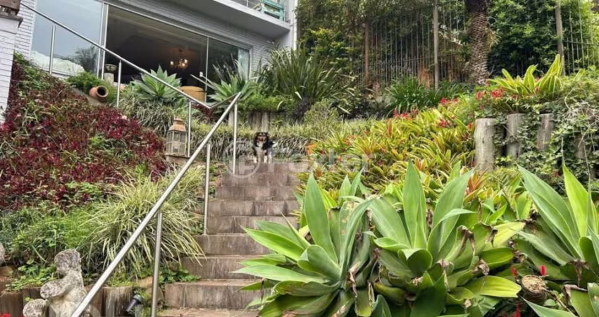 Casa com 3 quartos à venda na Rua Edgar Luiz Schneider, 480, Jardim Isabel, Porto Alegre