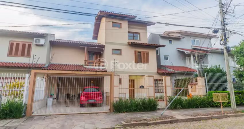 Casa com 3 quartos à venda na Rua Luiz Delfino, 109, Espírito Santo, Porto Alegre