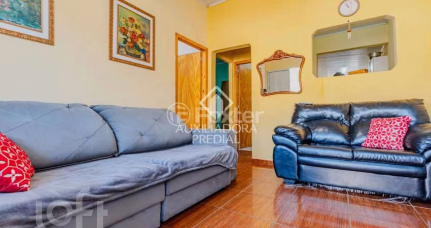 Casa com 2 quartos à venda na Rua Querubim Costa, 86, Coronel Aparício Borges, Porto Alegre