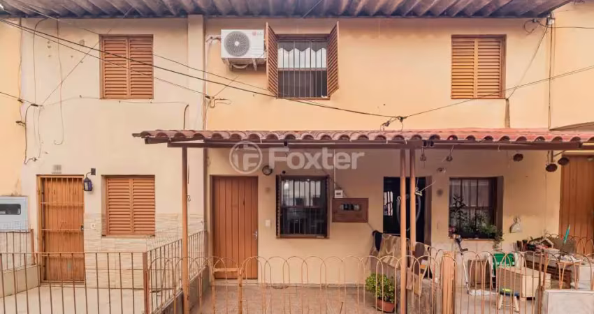Casa em condomínio fechado com 2 quartos à venda na Avenida Vicente Monteggia, 2772, Cavalhada, Porto Alegre