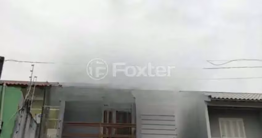 Casa com 2 quartos à venda na Avenida do Comércio, 561, Morada do Vale II, Gravataí