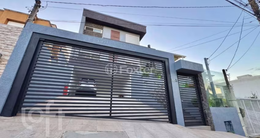 Casa com 3 quartos à venda na Rua Verdes Campos, 110, Mário Quintana, Porto Alegre