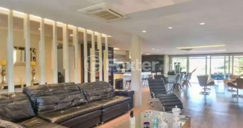 Casa em condomínio fechado com 4 quartos à venda na Avenida Juca Batista, 8000, Ponta Grossa, Porto Alegre