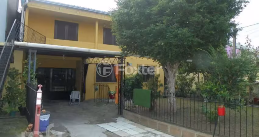 Casa com 3 quartos à venda na Avenida Monte Cristo, 515, Vila Nova, Porto Alegre