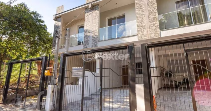 Casa com 3 quartos à venda na Rua Abdo Jorge Curi, 233, Parque Santa Fé, Porto Alegre