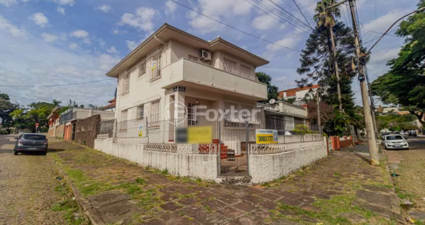 Casa com 4 quartos à venda na Rua Paissandu, 358, Partenon, Porto Alegre