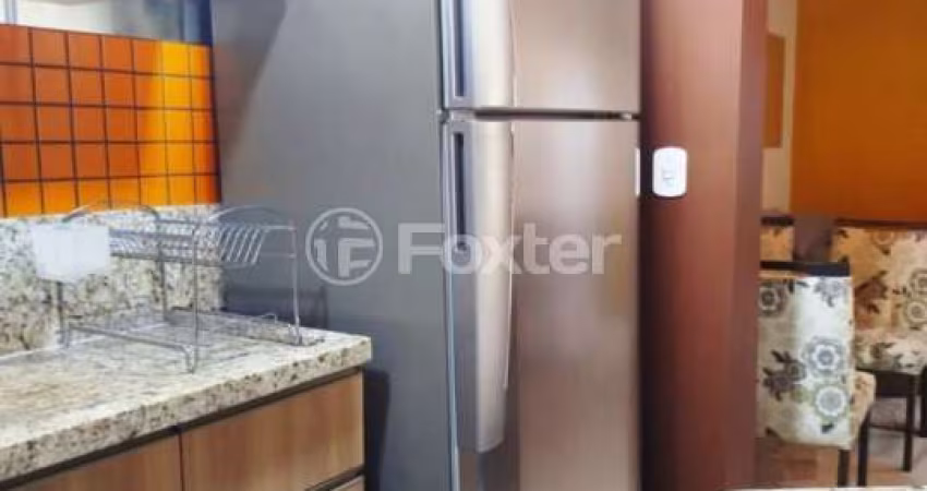 Casa em condomínio fechado com 2 quartos à venda na Avenida Guarujá, 126, Guarujá, Porto Alegre