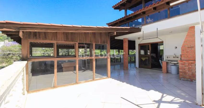 Apartamento com 4 quartos à venda na Rua Erechim, 543, Nonoai, Porto Alegre