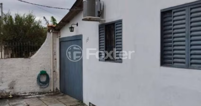 Casa com 2 quartos à venda na Rua Porto Belo, 125, COHAB A, Gravataí