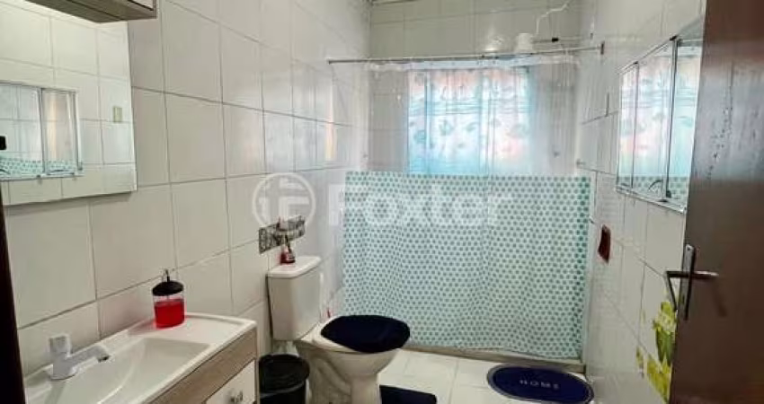 Casa comercial com 2 salas à venda na Rua Paulino Azurenha, 1253, Partenon, Porto Alegre