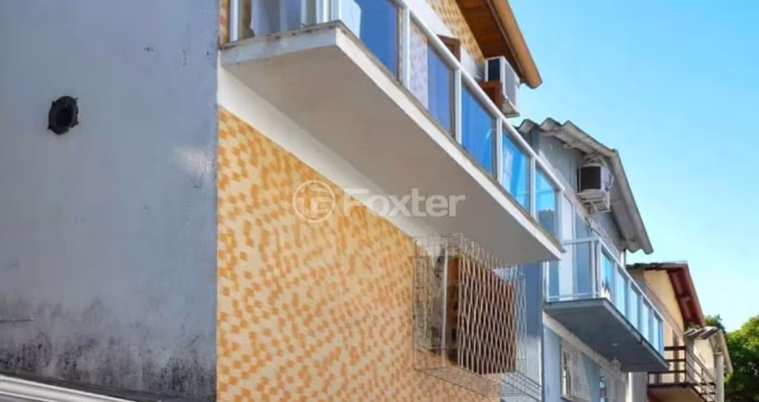 Casa em condomínio fechado com 3 quartos à venda na Rua Erechim, 293, Nonoai, Porto Alegre