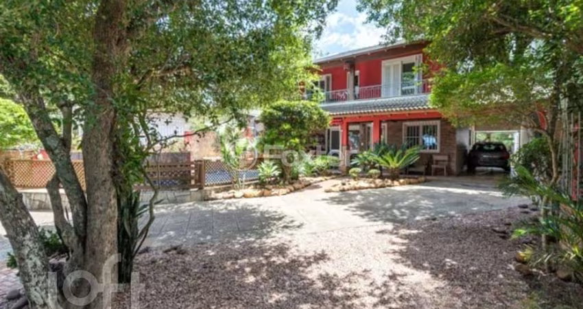 Casa com 4 quartos à venda na Avenida Guaíba, 10660, Ipanema, Porto Alegre