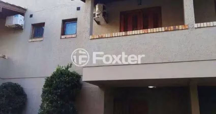 Casa em condomínio fechado com 2 quartos à venda na Avenida Guarujá, 126, Guarujá, Porto Alegre