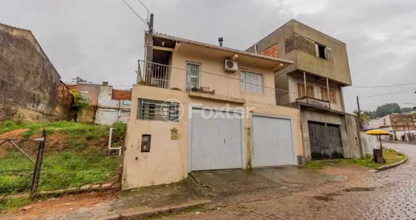 Casa com 4 quartos à venda na Rua Nunes Costa, 1080, Vila São José, Porto Alegre