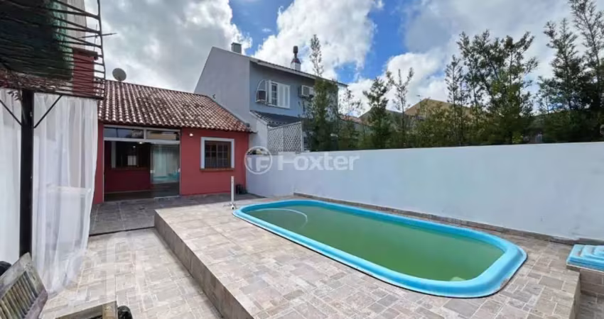 Casa com 2 quartos à venda na Rua Edgar Sanches Laurent, 76, Hípica, Porto Alegre