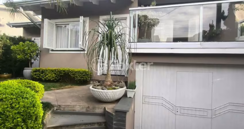 Casa com 3 quartos à venda na Rua Antônio Ramos, 219, Loteamento Jardim Timbaúva, Gravataí