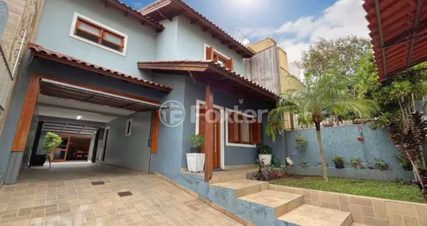 Casa com 3 quartos à venda na Rua Sargento Bruno Feldmann, 80, Guarujá, Porto Alegre